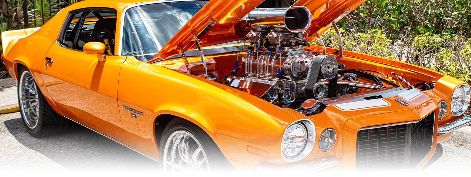 Orange Classic Car Showing Engine